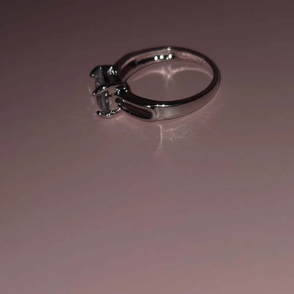 Macy's Silver Ring with Clear Gemstone - Picture 2 of 3